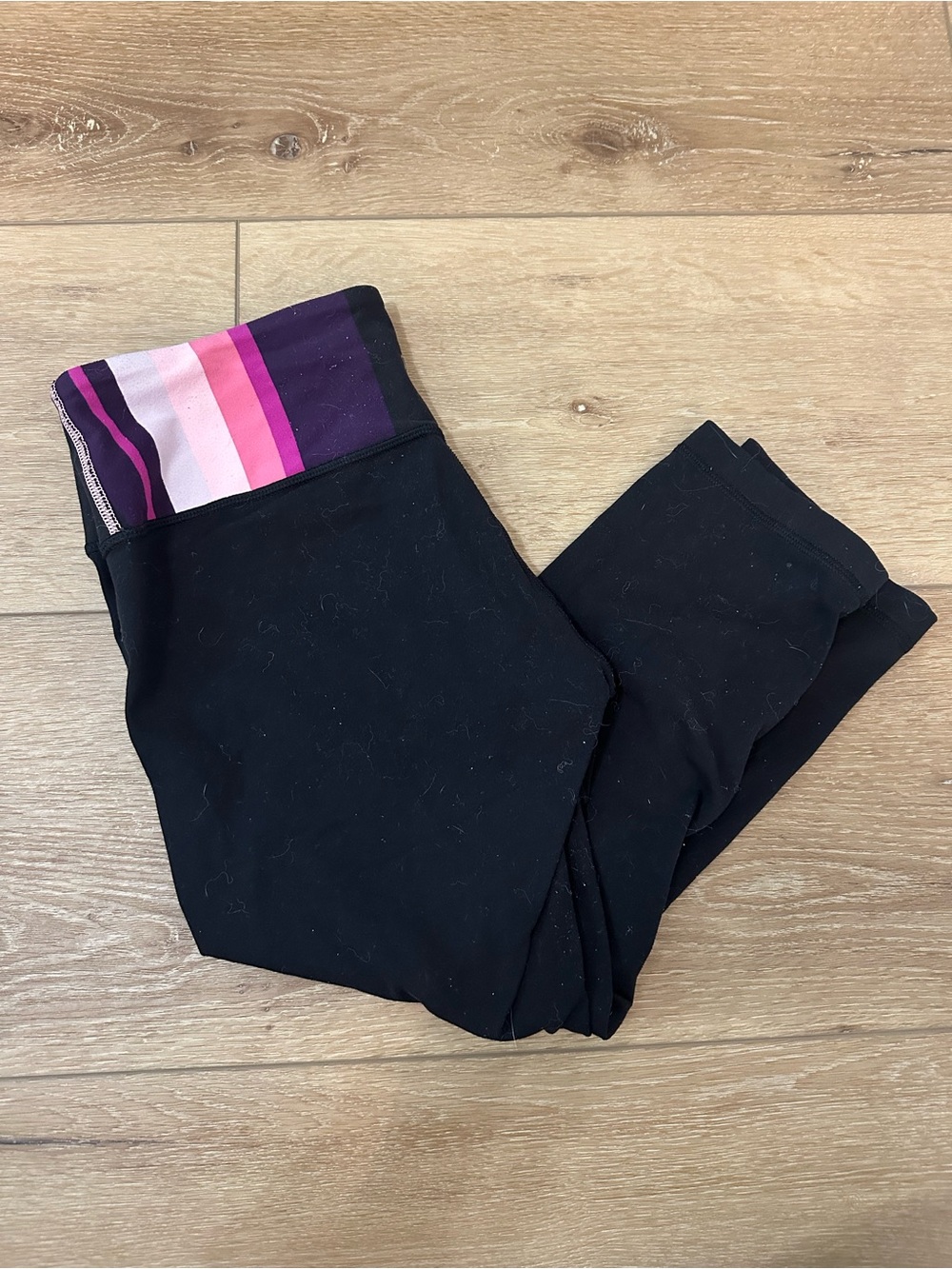 lululemon Mid-Calf Black Leggings with Pink & Purple Striped Waistband